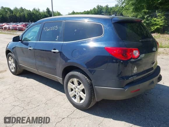 2012 Chevrolet Traverse 2LT with VIN 1GNKVJED5CJ353562, listed as a IAAI auction lot 42610005 with 185,201 mi miles and . Bid and sale history available at DreamBid. Image 3.
