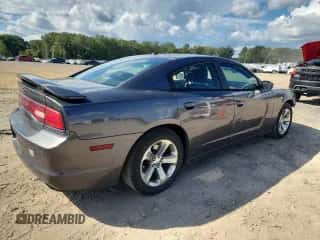 2013 Dodge Charger SE с VIN 2C3CDXBG2DH711189, выставлен на аукционе Copart как лот 85579405 с пробегом 181 504 миль миль и Списание • Salvage title. История ставок и продаж доступна на DreamBid. Изображение 3.