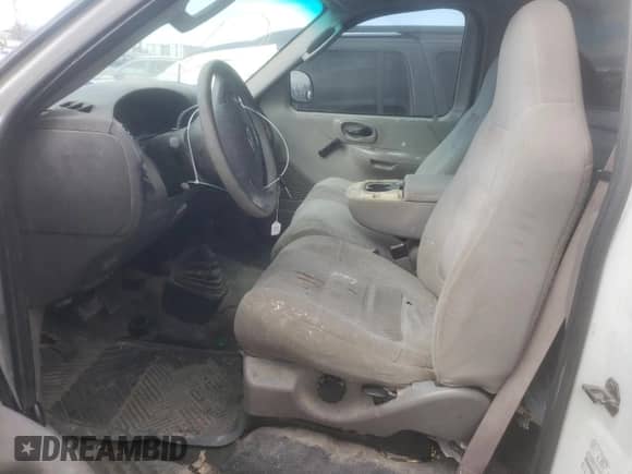 2003 Ford F-150 XL z VIN 2FTRF18W53CA04398, wystawiony jako Copart lot #42981485 z przebiegiem 244 706 mil mil oraz Szkoda całkowita • Salvage title. Historia ofert i sprzedaży dostępna na DreamBid. Obrazek 7.