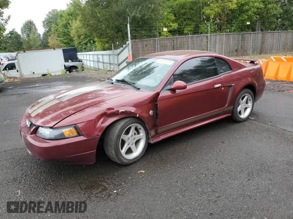 2004 Ford Mustang Standard z VIN 1FAFP40484F109752, wystawiony jako Copart lot #84595275 z przebiegiem 60 910 mil mil oraz Szkoda całkowita • Salvage title. Historia ofert i sprzedaży dostępna na DreamBid. Obrazek 1.