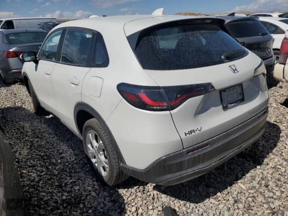 2023 Honda HR-V LX z VIN 3CZRZ2H37PM740430, wystawiony jako Copart lot #68395635 z przebiegiem 91 723 mil mil oraz Szkoda całkowita • Salvage title. Historia ofert i sprzedaży dostępna na DreamBid. Obrazek 2.