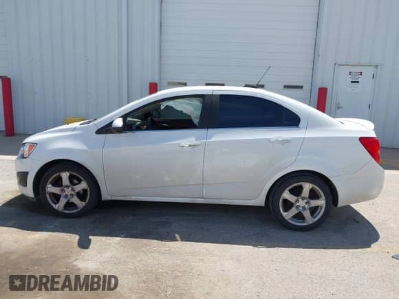 2015 Chevrolet Sonic LTZ with VIN 1G1JE5SBXF4140813, listed as a IAAI auction lot 42219942 with 102,165 mi miles and . Bid and sale history available at DreamBid. Image 14.