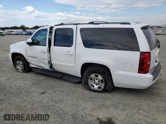2009 Chevrolet Suburban 2LT с VIN 1GNFK263X9J105175, выставлен на аукционе Copart как лот 83761685 с пробегом 229 787 миль миль и Списание • Salvage title. История ставок и продаж доступна на DreamBid. Изображение 2.