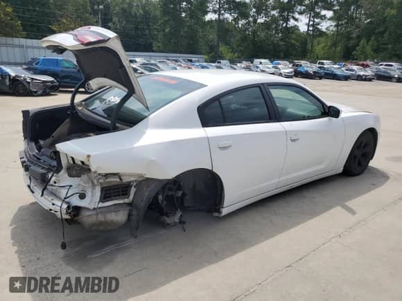2014 Dodge Charger SE с VIN 2C3CDXBG8EH266538, выставлен на аукционе Copart как лот 69022355 с пробегом 125 546 миль миль и Списание • Salvage title. История ставок и продаж доступна на DreamBid. Изображение 3.