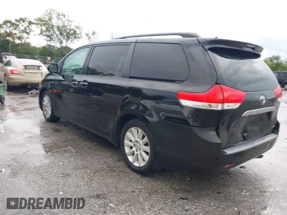 2011 Toyota Sienna XLE AAS with VIN 5TDYK3DC4BS020769, listed as a IAAI auction lot 42734372 with 154,551 mi miles and . Bid and sale history available at DreamBid. Image 3.