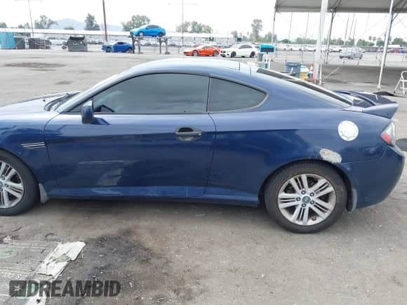 2007 Hyundai Tiburon GS with VIN KMHHM66D47U253809, listed as a IAAI auction lot 42777962 with 176,002 mi miles and . Bid and sale history available at DreamBid. Image 14.