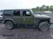 2023 Jeep Wrangler Sahara with VIN 1C4JJXP64PW684210, listed as a IAAI auction lot 42244388 with 23,622 mi miles and . Bid and sale history available at DreamBid. Image 13.