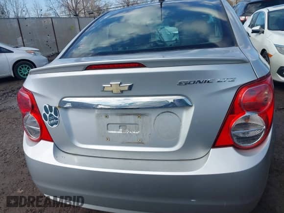 2013 Chevrolet Sonic LTZ with VIN 1G1JE5SH1D4166802, listed as a IAAI auction lot 41634168 with 86,351 mi miles and . Bid and sale history available at DreamBid. Image 16.