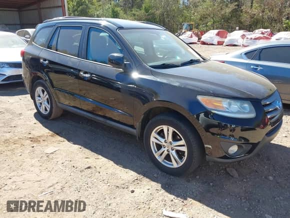 2012 Hyundai Santa Fe Limited z VIN 5XYZK3AB8CG131257, wystawiony jako IAAI lot #43444042 z przebiegiem 90 517 mil mil oraz . Historia ofert i sprzedaży dostępna na DreamBid. Obrazek 1.