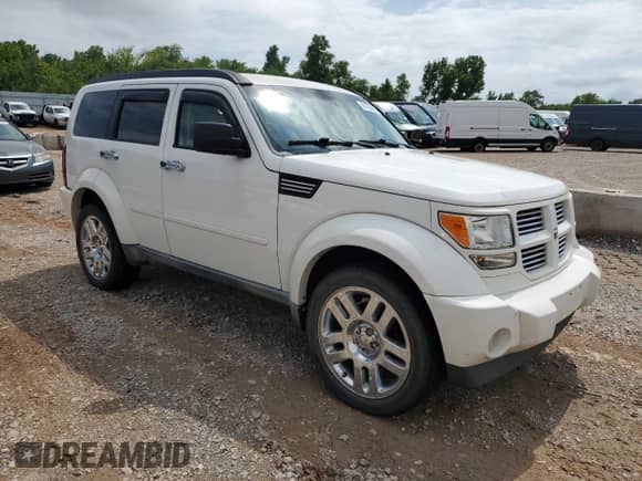 2010 Dodge Nitro Heat with VIN 1D4PT4GK1AW158630, listed as a Copart auction lot 61755085 with 164,406 mi miles and Clean title. Bid and sale history available at DreamBid. Image 4.