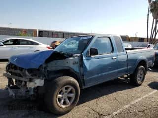 2002 Nissan Frontier XE with VIN 1N6DD26S02C364220, listed as a Copart auction lot 67273015 with 178,357 mi miles and Salvage title. Bid and sale history available at DreamBid. Image 1.
