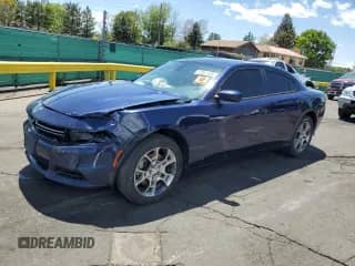 2015 Dodge Charger SE with VIN 2C3CDXFG3FH815378, listed as a Copart auction lot 57861125 with 135,452 mi miles and Salvage title. Bid and sale history available at DreamBid. Image 1.