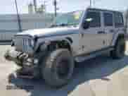2021 Jeep Wrangler Unlimited Sahara z VIN 1C4HJXEN3MW592171, wystawiony jako Copart lot #62216705 z przebiegiem 85 257 mil mil oraz Szkoda całkowita • Salvage title. Historia ofert i sprzedaży dostępna na DreamBid. Obrazek 1.