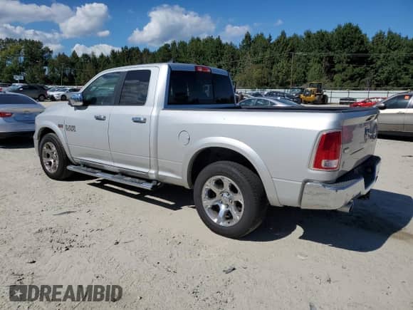 2014 Ram 1500 Laramie с VIN 1C6RR7JT1ES266497, выставлен на аукционе Copart как лот 84878445 с пробегом 95 194 миль миль и Списание • Salvage title. История ставок и продаж доступна на DreamBid. Изображение 2.