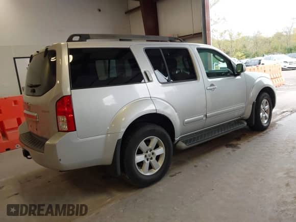 2011 Nissan Pathfinder LE z VIN 5N1AR1NB7BC605804, wystawiony jako IAAI lot #43544229 z przebiegiem 170 691 mil mil oraz . Historia ofert i sprzedaży dostępna na DreamBid. Obrazek 4.