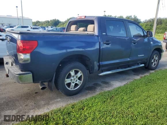2007 Toyota Tundra SR5 z VIN 5TBET54117S455677, wystawiony jako Copart lot #74101544 z przebiegiem Nie podano mil oraz Szkoda całkowita • Salvage title. Historia ofert i sprzedaży dostępna na DreamBid. Obrazek 3.