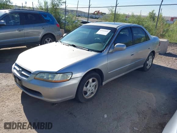 1999 Honda Accord EX with VIN 1HGCG6677XA032966, listed as a IAAI auction lot 43132911 with 219,402 mi miles and . Bid and sale history available at DreamBid. Image 2.