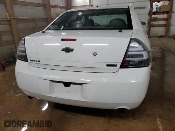 2013 Chevrolet Impala Police with VIN 2G1WD5E30D1261680, listed as a Copart auction lot 85213524 with 150,106 mi miles and Salvage title. Bid and sale history available at DreamBid. Image 6.