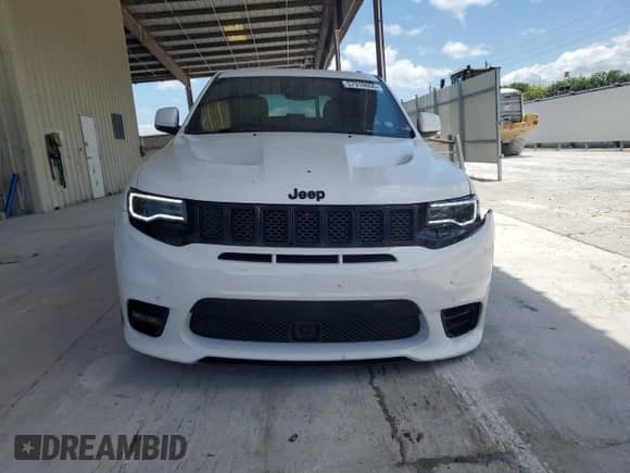 2018 Jeep Grand Cherokee SRT с VIN 1C4RJFDJ5JC397246, выставлен на аукционе Copart как лот 57310555 с пробегом 79 552 миль миль и Списание • Salvage title. История ставок и продаж доступна на DreamBid. Изображение 5.