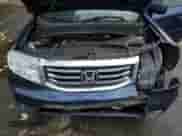 2014 Honda Pilot EX-L with VIN 5FNYF4H79EB025126, listed as a Copart auction lot 57493885 with 136,739 mi miles and Salvage title. Bid and sale history available at DreamBid. Image 12.