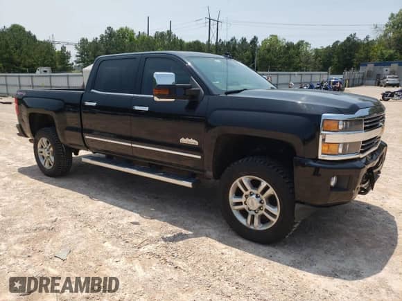 2015 Chevrolet Silverado 2500HD High Country с VIN 1GC1KXEG1FF620567, выставлен на аукционе Copart как лот 59094405 с пробегом 75 143 миль миль и Списание • Salvage title. История ставок и продаж доступна на DreamBid. Изображение 4.
