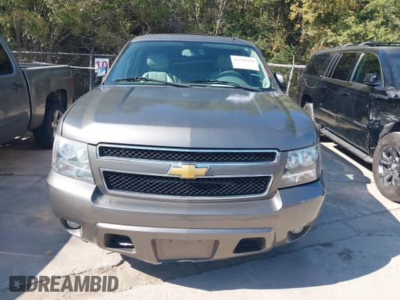 2011 Chevrolet Suburban LT with VIN 1GNSCJE0XBR386334, listed as a IAAI auction lot 43396959 with 264,786 mi miles and . Bid and sale history available at DreamBid. Image 12.