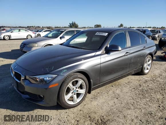 2014 BMW 3 Series 320i with VIN WBA3B1C56EP680339, listed as a Copart auction lot 82658825 with 76,283 mi miles and Salvage title. Bid and sale history available at DreamBid. Image 1.
