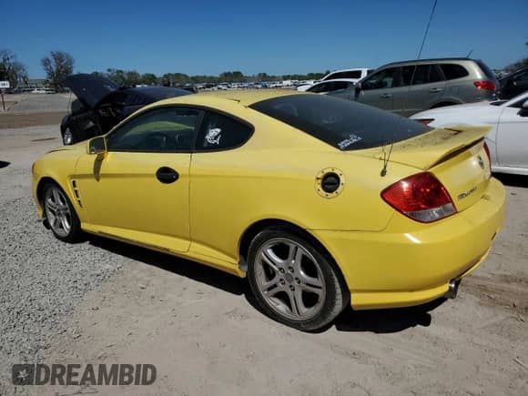 2006 Hyundai Tiburon GT с VIN KMHHN65F96U203308, выставлен на аукционе Copart как лот 47278684 с пробегом 186 123 миль миль и Списание • Salvage title. История ставок и продаж доступна на DreamBid. Изображение 2.