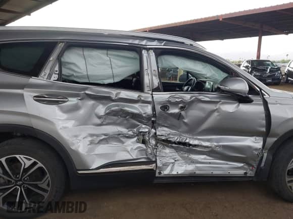 2020 Hyundai Santa Fe Limited with VIN 5NMS53AA1LH220156, listed as a IAAI auction lot 42181295 with 52,867 mi miles and . Bid and sale history available at DreamBid. Image 14.