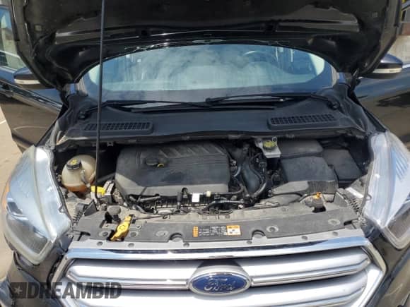 2017 Ford Escape Titanium с VIN 1FMCU0JD3HUC22843, выставлен на аукционе Copart как лот 64281665 с пробегом 155 907 миль миль и Списание • Salvage title. История ставок и продаж доступна на DreamBid. Изображение 11.