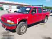 2001 Dodge Dakota Sport with VIN 1B7GG2AN11S208720, listed as a IAAI auction lot 42608802 with 143,792 mi miles and . Bid and sale history available at DreamBid. Image 2.