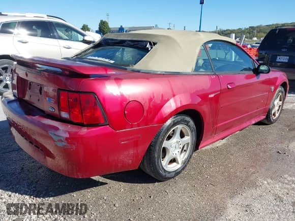 2004 Ford Mustang Deluxe z VIN 1FAFP44684F163127, wystawiony jako IAAI lot #43498923 z przebiegiem 144 018 mil mil oraz . Historia ofert i sprzedaży dostępna na DreamBid. Obrazek 4.