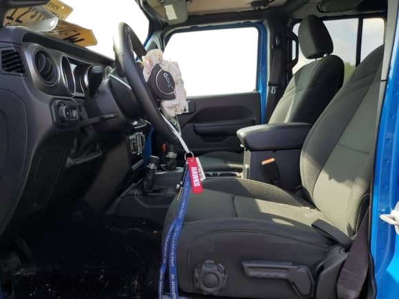 2023 Jeep Wrangler Sport S with VIN 1C4HJXDG7PW677814, listed as a Copart auction lot 67802085 with 28,546 mi miles and Salvage title. Bid and sale history available at DreamBid. Image 7.