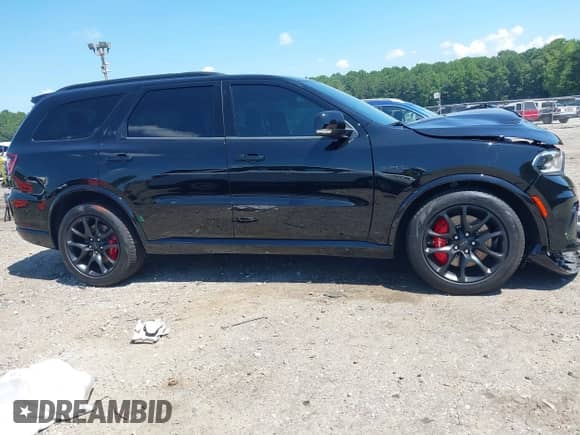 2024 Dodge Durango SRT 392 Plus with VIN 1C4SDJGJ8RC154212, listed as a IAAI auction lot 42712350 with 1,261 mi miles and . Bid and sale history available at DreamBid. Image 13.