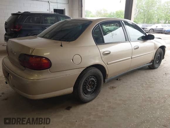 2004 Chevrolet Malibu Classic z VIN 1G1ND52F34M603489, wystawiony jako IAAI lot #42285967 z przebiegiem 146 882 mil mil oraz . Historia ofert i sprzedaży dostępna na DreamBid. Obrazek 4.