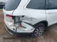 2021 Honda Pilot EX-L z VIN 5FNYF6H56MB064149, wystawiony jako IAAI lot #42872341 z przebiegiem 75 886 mil mil oraz . Historia ofert i sprzedaży dostępna na DreamBid. Obrazek 6.