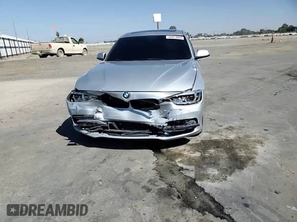 2018 BMW 3 Series 330e with VIN WBA8E1C52JA167468, listed as a Copart auction lot 69873605 with 98,631 mi miles and Salvage title. Bid and sale history available at DreamBid. Image 13.