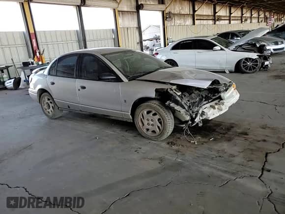 2002 Saturn SL с VIN 1G8ZF52822Z246613, выставлен на аукционе Copart как лот 66984065 с пробегом 160 389 миль миль и Списание • Salvage title. История ставок и продаж доступна на DreamBid. Изображение 13.