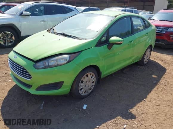 2015 Ford Fiesta SE z VIN 3FADP4BE7FM195510, wystawiony jako IAAI lot #43145299 z przebiegiem 217 962 mil mil oraz . Historia ofert i sprzedaży dostępna na DreamBid. Obrazek 2.