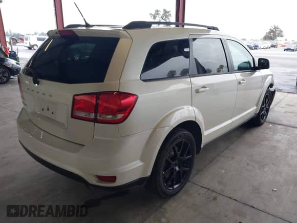 2013 Dodge Journey SXT with VIN 3C4PDCBB3DT661615, listed as a IAAI auction lot 43455375 with 99,763 mi miles and . Bid and sale history available at DreamBid. Image 4.