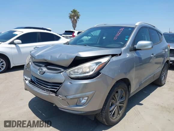 2014 Hyundai Tucson SE with VIN KM8JU3AG9EU859041, listed as a IAAI auction lot 42762236 with 107,785 mi miles and . Bid and sale history available at DreamBid. Image 2.