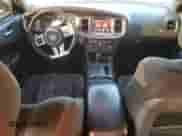 2013 Dodge Charger SRT-8 Super Bee z VIN 2C3CDXGJ3DH696478, wystawiony jako Copart lot #74125964 z przebiegiem 148 909 mil mil oraz Czysty tytuł • Clean title. Historia ofert i sprzedaży dostępna na DreamBid. Obrazek 8.