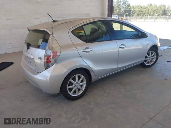 2013 Toyota Prius Three with VIN JTDKDTB31D1554511, listed as a IAAI auction lot 42859245 with 74,850 mi miles and . Bid and sale history available at DreamBid. Image 4.