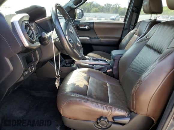 2017 Toyota Tacoma Limited with VIN 3TMGZ5AN1HM047607, listed as a Copart auction lot 61805235 with 104,142 mi miles and Salvage title. Bid and sale history available at DreamBid. Image 7.