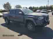 2018 Toyota Tacoma SR5 z VIN 3TMAZ5CN0JM059076, wystawiony jako Copart lot #71305965 z przebiegiem 80 502 mil mil oraz Szkoda całkowita • Salvage title. Historia ofert i sprzedaży dostępna na DreamBid. Obrazek 4.