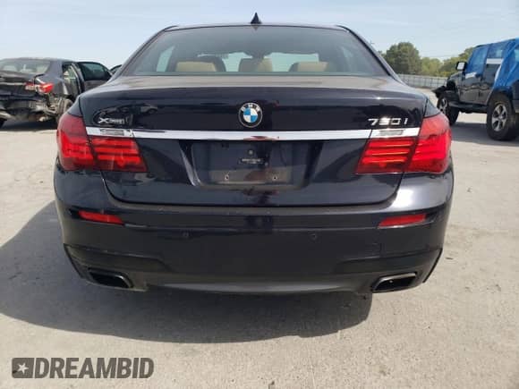 2015 BMW 7 Series 750i xDrive с VIN WBAYB6C5XFD966183, выставлен на аукционе Copart как лот 70422505 с пробегом 88 599 миль миль и Списание • Salvage title. История ставок и продаж доступна на DreamBid. Изображение 6.