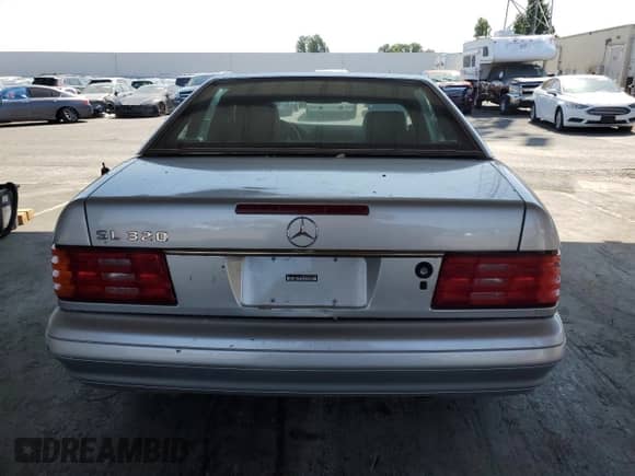 1997 Mercedes-Benz SL 500 с VIN WDBFA63F4VF151940, выставлен на аукционе Copart как лот 62199725 с пробегом 145 084 миль миль и Чистый • Clean title. История ставок и продаж доступна на DreamBid. Изображение 6.