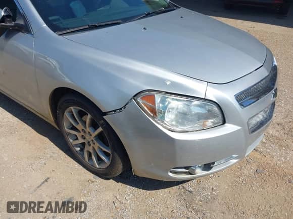 2012 Chevrolet Malibu LTZ z VIN 1G1ZG5E7XCF271129, wystawiony jako IAAI lot #42713063 z przebiegiem 127 511 mil mil oraz . Historia ofert i sprzedaży dostępna na DreamBid. Obrazek 13.