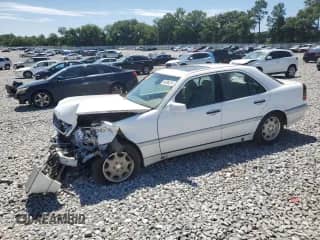 1998 Mercedes-Benz C 230/260/280/320 z VIN WDBHA23G0WA608980, wystawiony jako Copart lot #64308315 z przebiegiem 176 172 mil mil oraz Szkoda całkowita • Salvage title. Historia ofert i sprzedaży dostępna na DreamBid. Obrazek 1.