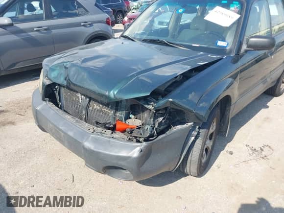 2005 Subaru Forester X with VIN JF1SG63635H700679, listed as a IAAI auction lot 42989089 with 77,512 mi miles and . Bid and sale history available at DreamBid. Image 6.